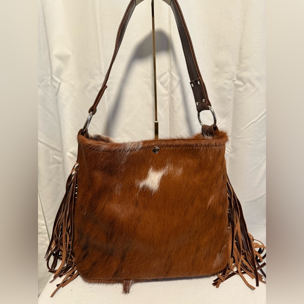 Handmade leather / animal bag. Never used.